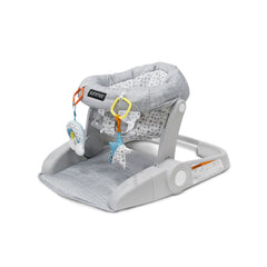 Bright Starts Learn-to-Sit seat front view shows cozy support for early sitting.