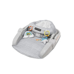 Bright Starts Learn-to-Sit seat side view highlights adjustable height for growing babies.