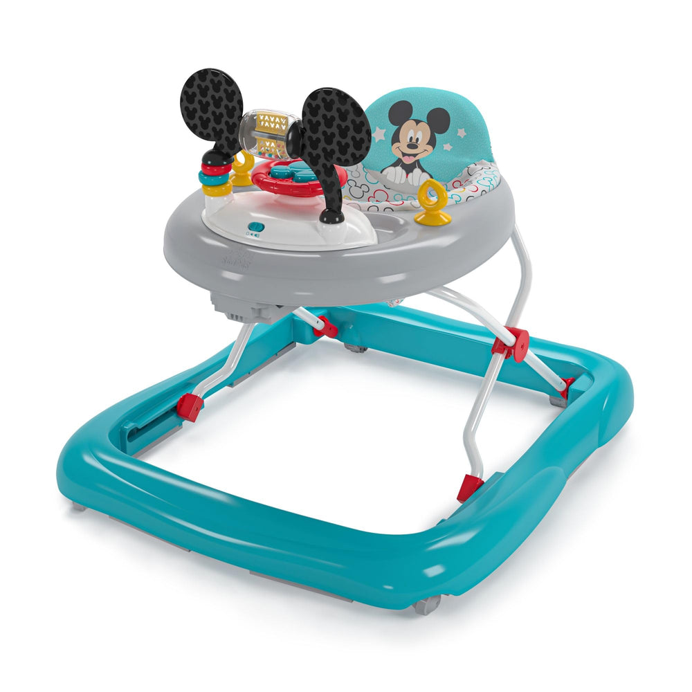 Bright Starts Mickey Mouse walker frame folds for easy storage and travel.