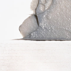 Briogeo Scalp Revival close-up of charcoal particles for gentle exfoliation