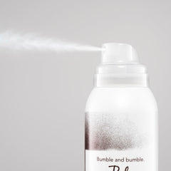 Bumble and bumble dry shampoo applied to roots for quick root refresh.