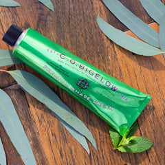 C.O. Bigelow shaving cream rich lather with brush ready for shave