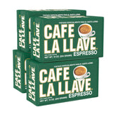 Cafe La Llave dark roast bricks ready for espresso extraction with rich crema.