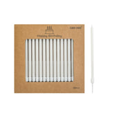 CAKE CODE pearl white long candles on a cake for elegant celebrations