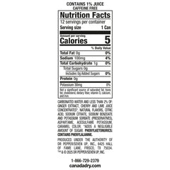 Pouring Canada Dry Fruit Splash Cherry Ginger Ale into a glass.