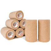 CARBOU beige self-adherent bandage on a wrist for secure, comfortable support.