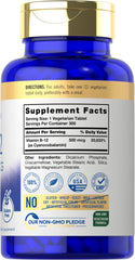 Closeup of B-12 tablets highlighting vegetarian and gluten-free features.