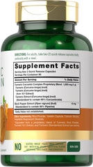 Carlyle Curcumin capsules close-up, featuring an easy-to-swallow design for everyday use.