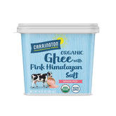 Carrington Farms ghee with Himalayan salt bottle on kitchen counter for high-heat cooking