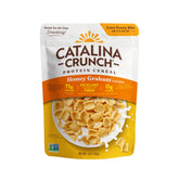 Catalina Crunch honey graham cereal in a bowl, high-protein breakfast option