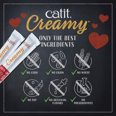 Catit Creamy Treat hand-fed during a bonding snack
