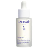 Caudalie Vinoperfect serum bottle application for daily brightening routine.