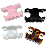 Celine butterfly hair clip in black with secure hold for updos.