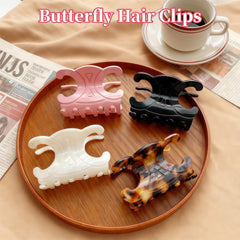 Celine butterfly hair clip in pink ideal for polished looks.