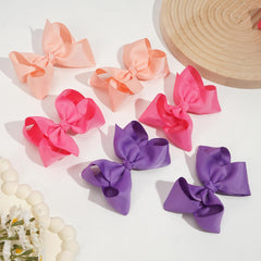 Celllot premium thick ribbon bows add pop to girls' hairstyles.