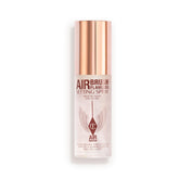 Charlotte Tilbury Airbrush Flawless Setting Spray bottle close-up showing long-lasting makeup hold.