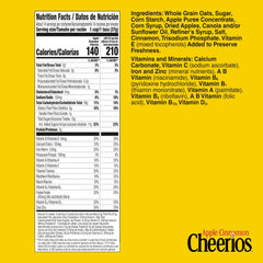 Pouring Cheerios Apple Cinnamon cereal highlights crunchy oats and cinnamon aroma.