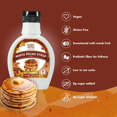 ChocZero Maple Pecan Syrup bottle beside a glass with syrup finish