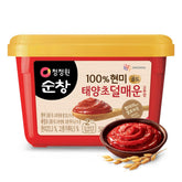 Chung Jung One gochujang bottle pour enhances authentic Korean flavor in bowls