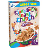 Cinnamon Toast Crunch large size box on pantry shelf for quick breakfasts.