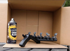 Citadel Chaos Black spray-primer can evenly coats metal miniatures with quick-drying properties.