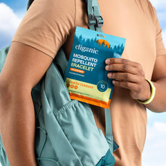 Cliganic mosquito repellent bracelets on kids' wrists during a park stroll