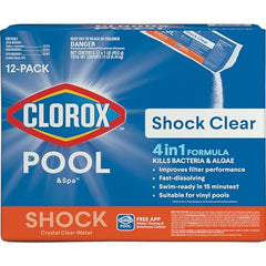 Clorox Pool&Spa Shock Clear bottle pouring for quick chlorination.