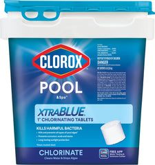 Clorox Pool&Spa XtraBlue 1-inch tablet resting on pool edge, ready to dissolve and sanitize.