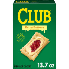 Club Crackers Extra Buttery box on table, ideal for quick snacking with friends.