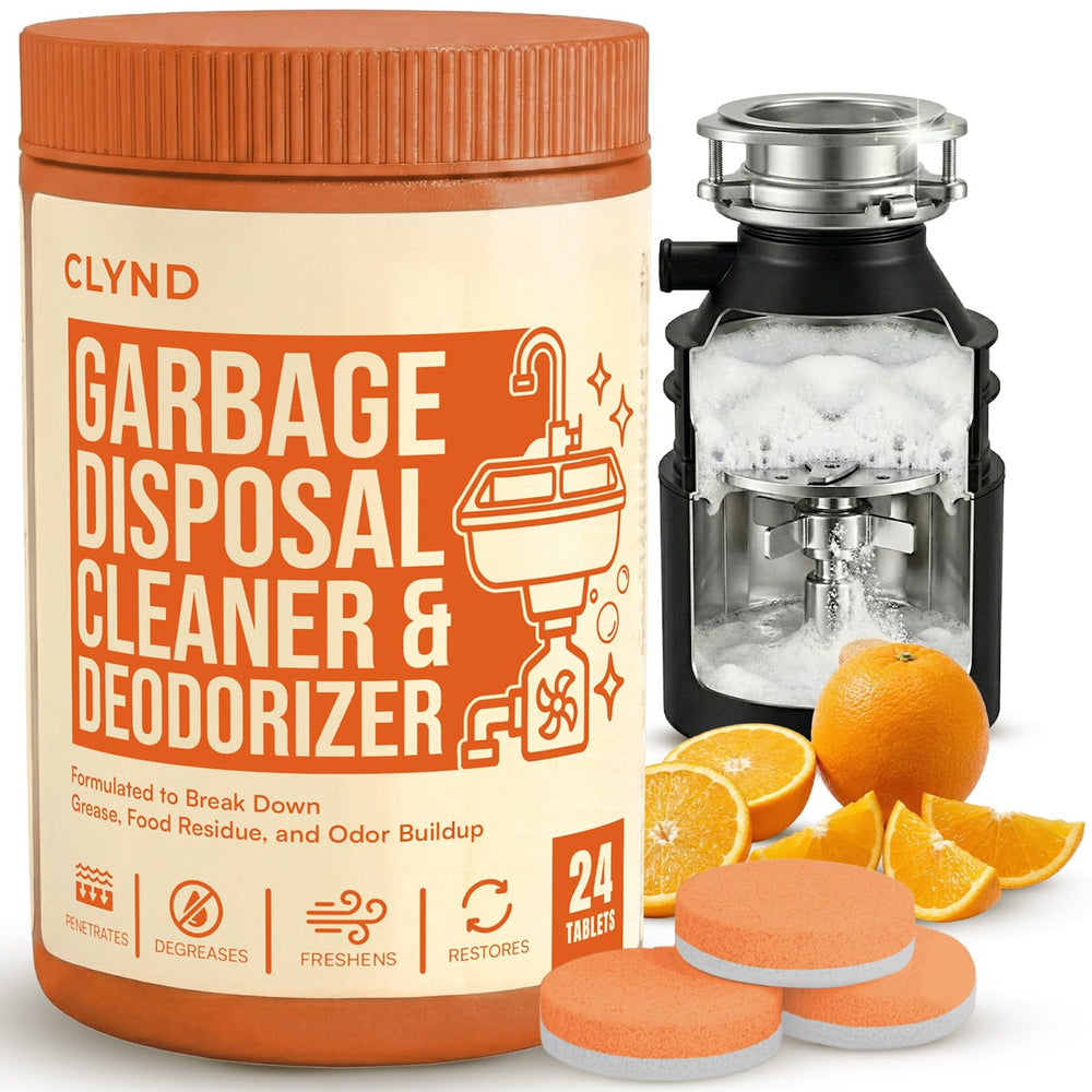 CLYND garbage disposal cleaner tablet in lemon-orange packaging for shelf storage