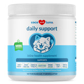 Coco and Luna daily multivitamin powder poured over cat food to support immune health.