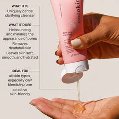 Cocokind AHA Jelly Cleanser foaming lather on skin.