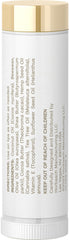 Close-up of Coera lip balm application for smooth, nourished lips.