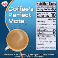Coffee-mate French Vanilla powder dissolving in mug for a smooth cup.