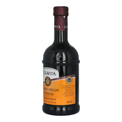 Colavita balsamic salad-dressing drizzle adds fruity depth to greens.