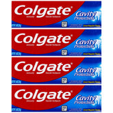 Colgate Cavity Protection toothpaste travel-size tubes, perfect for on-the-go freshness.