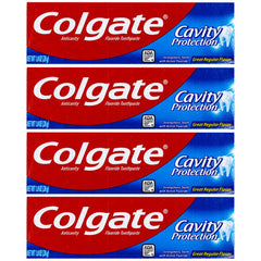 Colgate Cavity Protection toothpaste travel-size tubes, perfect for on-the-go freshness.