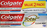 Colgate Total SF Clean Mint toothpaste 2-pack on bathroom shelf for whole mouth freshness.