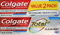 Colgate Total SF Clean Mint toothpaste 2-pack on bathroom shelf for whole mouth freshness.