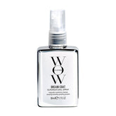 COLOR WOW Dream Coat spray bottle ready for styling, offering a humidity-resistant barrier.