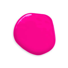 Colour Mill hot pink oil-based color being poured into batter for rich hues.