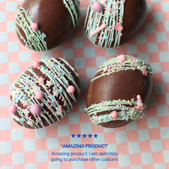 Six Colour Mill pastel bottles used for buttercream decoration.