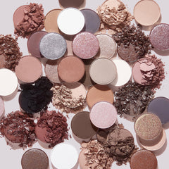 Stone Cold Fox palette pans showing vibrant color payoff in cool tones