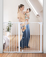 COMOMY 36-inch gate closed with double-lock system for added safety.