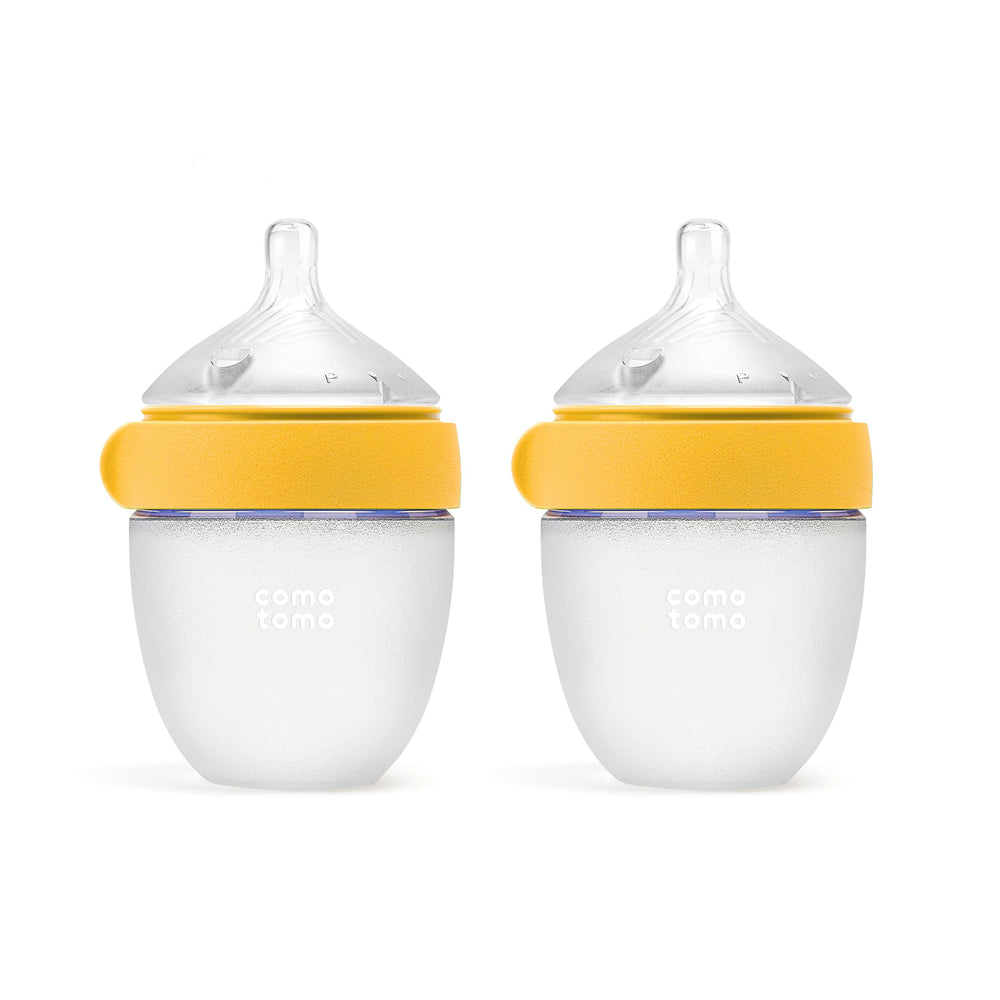 Comotomo Gen2 5oz bottle in yellow with true slow-flow nipple for calm feeding.