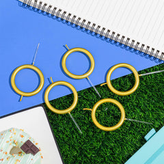Conelist 4-inch gold ring candle fits a variety of cakes.