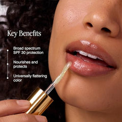 COOLA Liplux SPF 30 gloss shine on lips in sunlight