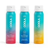 COOLA sunscreen spray kit front packshot with three 2oz bottles for travel-friendly protection.