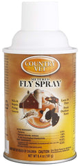Country Vet fly spray shown in an automatic dispenser setup for hands-free protection.