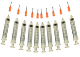 Creative Hobbies glue applicator syringe with orange precision tip for exact rhinestone placement